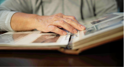 person looking at photo album