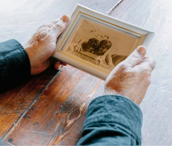 person looking at photo