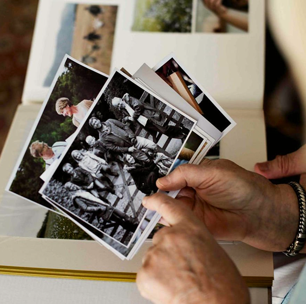 person looking at photos