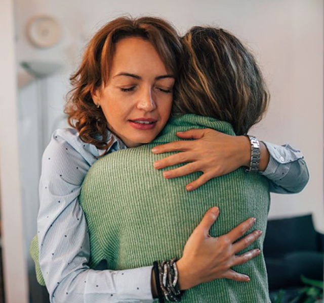 two women hugging