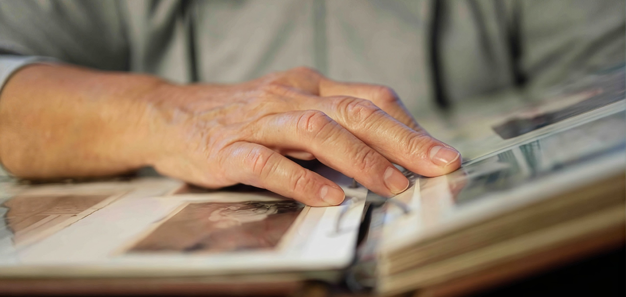 person looking at photo album